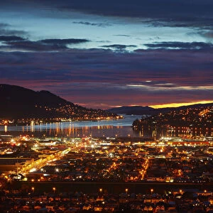 City lights, South Dunedin and Otago Harbor, Dunedin, South Island, New Zealand