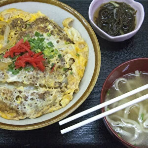 Classic pork over rice bowl with noodle soup served in Japan