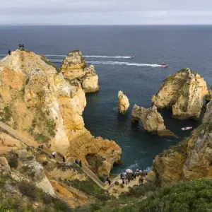 The cliffs and sea stacks of Ponta da Piedade at the rocky coast of the Algarve in Portugal The cliffs and sea stacks of Ponta da Piedade at the rocky coast of the Algarve in Portugal