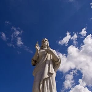 Close up of famous Christ statue on top of mountain overlooking Havana Cuba