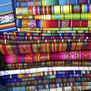 Colorful blankets at indigenous market in Pisac, Peru in the Sacred Valley