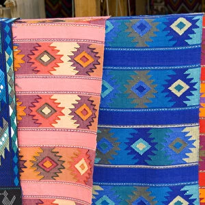 Colorful patterns and fabrics mademade artwork in San Antonio on remote Lake Atitlan