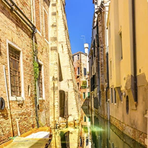 Colorful small boats. Building reflection, Venice, Italy
