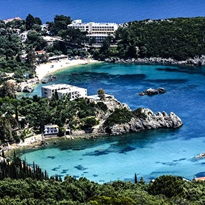 Corfu, Greece. Aerial view of beach, coves, Ionian Sea, and a resort