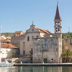 Croatia, Brac, Milna. Church of our Lady of the Annunciation 18th century dominates