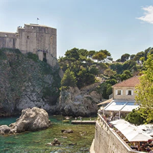 Croatia, Dubrovnik. Restaurant outside walled old city. St. Lawrence Fort