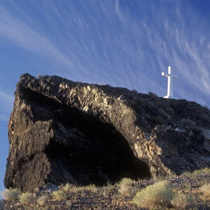 A cross stands proud atop Lizard Butte, Canyon County, ID, USA