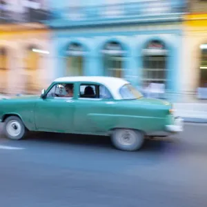 Cuba, Havana, Havana Vieja, UNESCO World Heritage Site, classic car in motion
