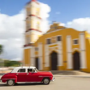 Cuba Remedios Print - Classic Red Car in Front of Cathedral