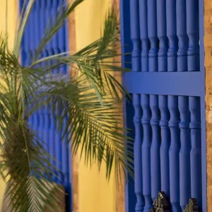 Cuba, Trinidad, UNESCO World Heritage Site, blue shutters in courtyard of Casa Particular, Spanish style colonial home. (PR)