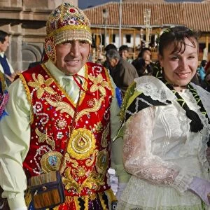 Dancers in bright beads and traditional dress in Main Square in Cusco Cuzco Peru South America
