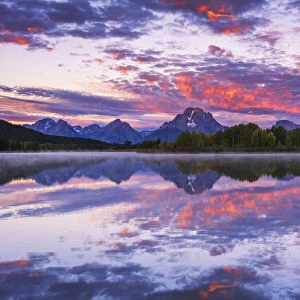 Dawn light over the Tetons from Oxbow Bend, Grand Teton National Park, Wyoming, USA