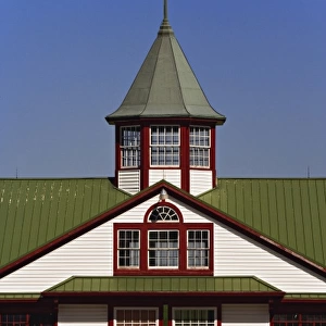 Distinctive red, white, and green colors of horse barn, Calumet Farm, Lexington, Kentucky