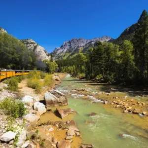 The Durango & Silverton Narrow Gauge Railroad on the Animas River, San Juan National Forest The Durango & Silverton Narrow Gauge Railroad on the Animas River, San Juan National Forest