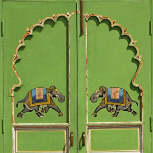 Elephants painted on green door, City Palace, Udaipur, India