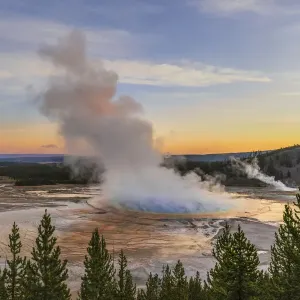 Elevated sunrise view of Grand Prismatic spring and colorful bacterial mat, Yellowstone National Park, Wyoming Elevated sunrise view of Grand Prismatic spring and colorful bacterial mat, Yellowstone National Park, Wyoming