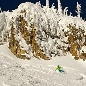Eleven-year-old Parkin Costain skis on a sunny day at Whitefish Mountain Resort in Montana