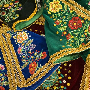 Embroidered skirst on display at market, Cuenca, Ecuador, South America