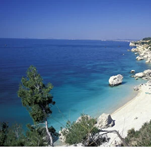 Europe, Albania. Coastal road South of Valona. White sand beach and crystal clear