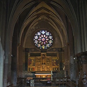 Europe, Belgium, Antwerp. A chapel under a rose window inside Onze Lieve Vrouwekathedraal