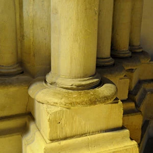Europe, France, Burgundy, Nievre, Nevers. Stone column in yellow light, Nevers Cathedral