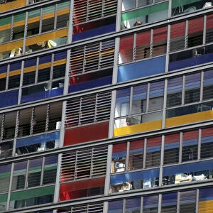 Europe, France, Lille. Colorful windows of the apartments adjacent to Lille Station