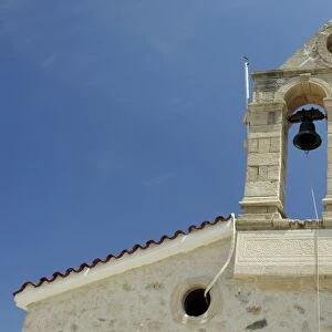 Europe, Greece, Crete (aka Kriti). Small village of Kato Aites, church bell tower