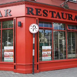 Europe, Ireland, Sligo. Outside of red bar and restaurant. Credit as: Wendy Kaveney