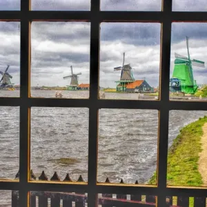 Europe; Netherlands; Zaandam; Zaanse Schans windmills on a cloudy day Europe; Netherlands; Zaandam; Zaanse Schans windmills on a cloudy day