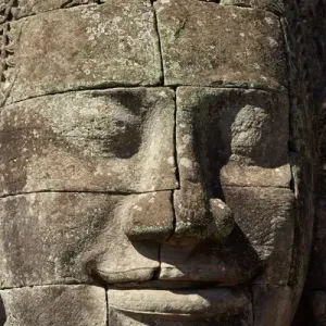 Face thought to depict Bodhisattva Avalokiteshvara, Bayon temple ruins, Angkor Thom Face thought to depict Bodhisattva Avalokiteshvara, Bayon temple ruins, Angkor Thom