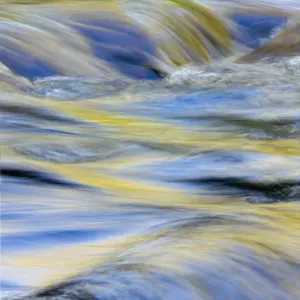 Flowing water and spring colors reflected on stream, Great Smoky Mountains National Park