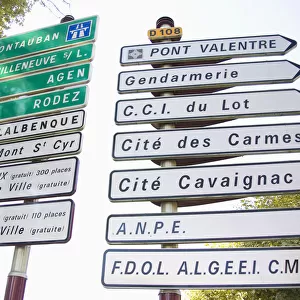 FRANCE, Midi-Pyrenees, Lot Department, Cahors. Many street signs in Cahors for walkers