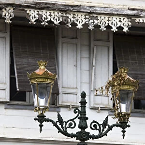 France, Reunion Island, St-Denis, streetlamps and old colonial buildings, Rue de Paris