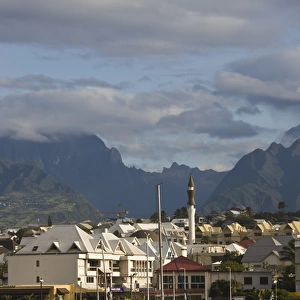 France, Reunion Island, St-Pierre, Harborfront with Cirque de Cilaos mountains in the background