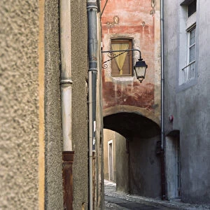 France, Viviers, Street with arched walkway