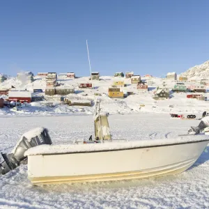 The frozen harbor. The traditional and remote Greenlandic Inuit village Kullorsuaq The frozen harbor. The traditional and remote Greenlandic Inuit village Kullorsuaq
