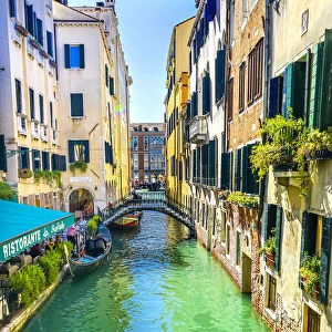 Gondola and tourist, Venice, Italy
