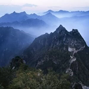 Great Wall in early morning mist, China