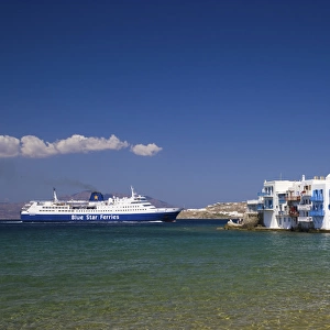 Greece and Greek Island of Mykonos and the harbor town of Hora Ferry coming into