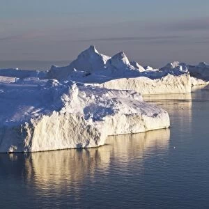 Greenland, Ilulissat, Icebergs grounded on submerged glacial moraine in Jakobshavn