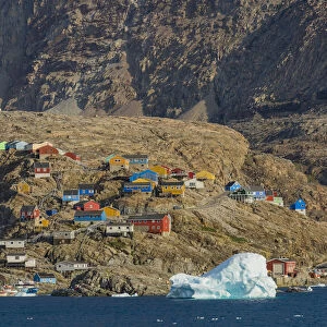 Greenland. Uummannaq. Colorful houses dot the rocky landscape