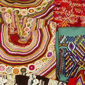 Guatemala: Antigua, detail of blouses called huipiles for sale, August