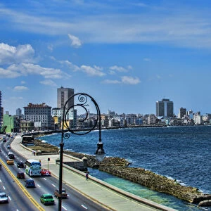 Havana Cuba beautiful road and walking Malecon along water in city from above building