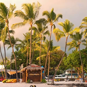 Hawaii, Big Island, Kona-Kailua. Beach shack and kayaks outside the King Kamehameha Hotel