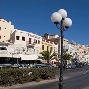 Hermoupolis, Syros Island, Greece. Main street shops and traffic