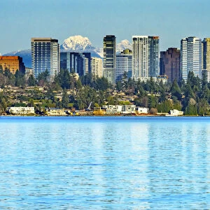 High-rise buildings, Lake Washington and snowcapped Cascade Mountains, Bellevue