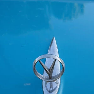 Detail of hood ornament on a classic blue American car in Vieja, old Habana, Havana, Cuba
