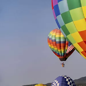 Hot air balloon bringing color to the sky. (Editorial Use Only)