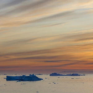 Ilulissat Icefjord also called kangia or Ilulissat Kangerlua, sunset over Disko Bay