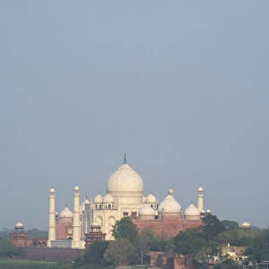 India, Agra. View of the Taj Mahal from the Red Fort of Agra. Sandstone fortress founded in 1565